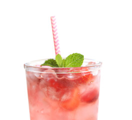 Glass of tasty strawberry lemonade on white background