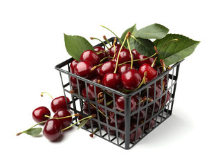 Plastic crate with ripe cherries on white background