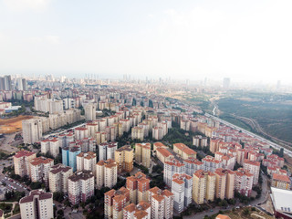 Obraz premium Aerial Drone View of Ugur Mumcu Aydos Forest with Buildings in Istanbul / Kartal