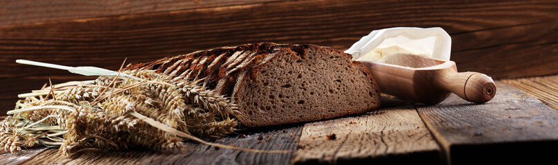 bread cutted on board from above. Kitchen or bakery poster design