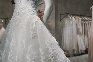 Fototapeta na wymiar Wedding dresses in a luxury shop