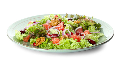 Plate with delicious fresh salad on white background