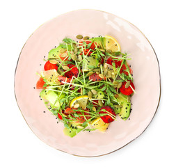 Plate with delicious fresh salad on white background