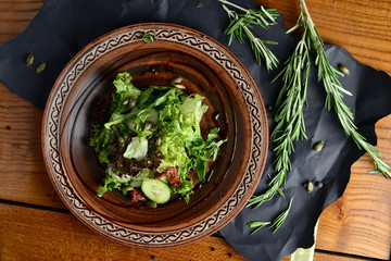 salad with dried tomatoes and pumpkin seeds