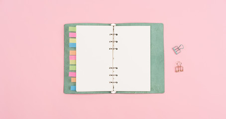 blank book on pink background