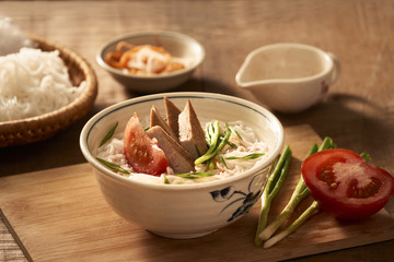 Bun cha ca - one of most popular soup noodle in the seaside area with rice noodle, grilled fish, green onion, tomato and fish sauce...