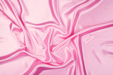 Obraz premium Pink luxury satin fabric texture for background