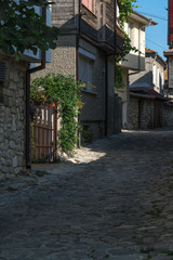 Fototapeta na wymiar old town of Nessebar, landmarks, ancient buildings and pavement