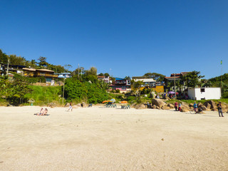 Florianopolis, Brazil - Circa July 2018: People enjoying a sunny day at Prainha da Barra, small beach near Barra da Lagoa