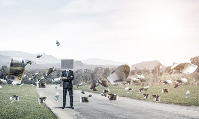 Businessman with monitor instead of head.