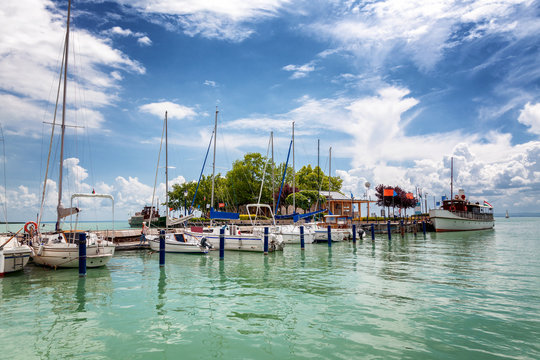 Beautiful view of the marina at the lake, blue sky in the clouds