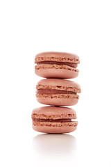tower of three strawberry flavored macaroons