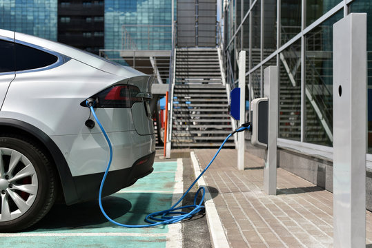 electric car charge on charging station