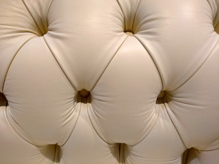 skin of structure. upholstery. background. beige. ivory. dairy.
