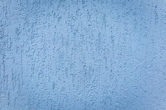 Texture Of A Blue Stucco Wall, Background With A Vignette