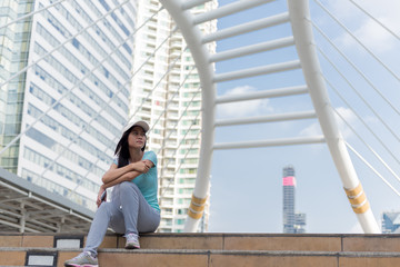 Young Sport woman resting after workout exercise.