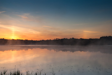 Obraz na płótnie Canvas Sunrise on the Kaitra lake