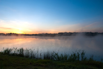 Fototapeta na wymiar Sunrise on the Kaitra lake