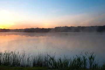 Obraz na płótnie Canvas Sunrise on the Kaitra lake