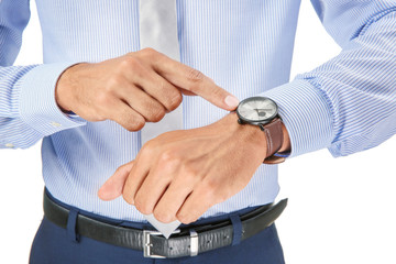 Businessman looking at his watch on white background, closeup. Time management concept