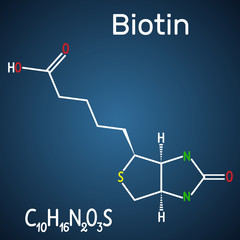 Biotin (vitamin B7). Structural chemical formula and molecule model on the dark blue background