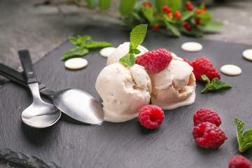 Delicious raspberry ice-cream on slate plate