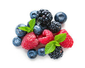 Delicious ripe berries on white background