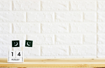 AUGUST 14 Wooden calendar Concept Pakistan national day.Copy space,minimal style