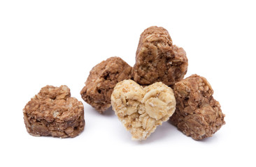 Oatmeal heart dessert isolated on white background