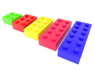 Five toy bricks on white