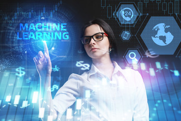The concept of business, technology, the Internet and the network. A young entrepreneur working on a virtual screen of the future and sees the inscription: Machine learning