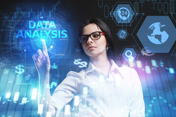The concept of business, technology, the Internet and the network. A young entrepreneur working on a virtual screen of the future and sees the inscription: Data analysis
