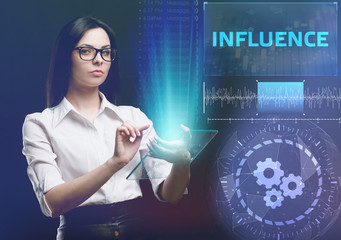The concept of business, technology, the Internet and the network. A young entrepreneur working on a virtual screen of the future and sees the inscription: Influence
