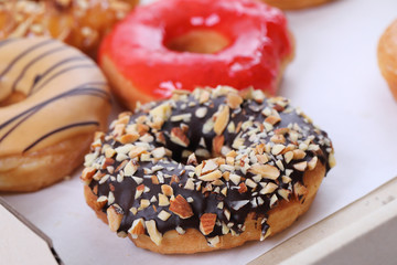 Chocolate almonds Donut isolated on white background
