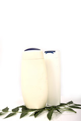 Ayurveda bath shop in white plastic bottle on white background.