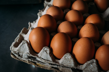 Close-up view of raw chicken eggs.