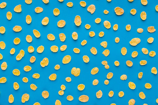 Yellow Flakes Pattern On Blue Background