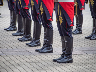 Obraz premium Old style soldier's legs in boots