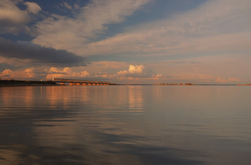 Amazing view to bridge and dam across the Dnieper river, Cherkasy, Ukraine at sunset