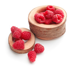 Composition with sweet ripe raspberries on white background