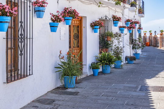 Beautiful view of old Mijas Calle Moro (Moro Street). Mijas (not far from Malaga) - Spanish hill town overlooking the Costa del Sol, known for its white-washed buildings. Mijas, Andalusia, Spain.
