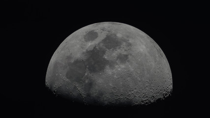Photo of moon in amateur telescope.