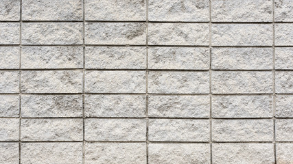 Naklejka premium Eine alte verwitterte Ziegelmauer als ein Hintergrund