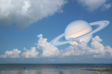 Saturn back cloud  sky on sea ,concept Saturn near Earth