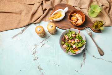 Composition with tasty shrimp salad on table