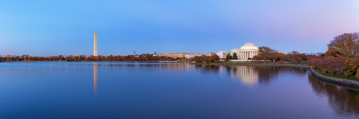 Jefferson Memorial and Washington Monument reflected on Tidal Basin in the evening, Washington DC, USA. Panoramic image