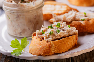 Pieces of fried bread with fish pate
