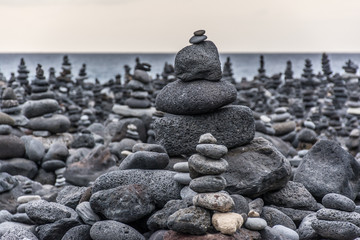 Volcanic rocks placed in pyramid mode, for enjoyment and relaxation. This unique place is located in the port of La Cruz in Tenerife (Spain)