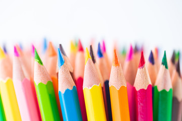 Education or back to school Concept. Close up macro shot of color pencil pile pencil nibs on white background.