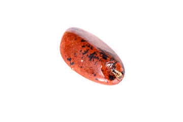 Macro mineral stone Obsidian on a white background